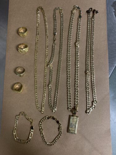 Four necklaces, four rings, and two bracelets. These are not real gold.