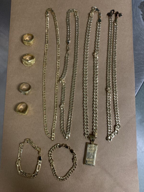 Four necklaces, four rings, and two bracelets. These are not real gold.