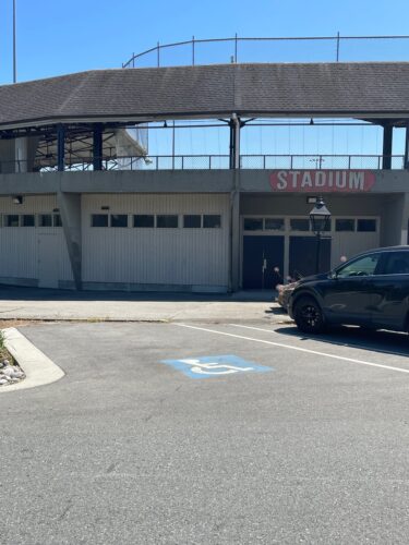 An accessible parking space in the parking lot of the Queen's Park Stadium.